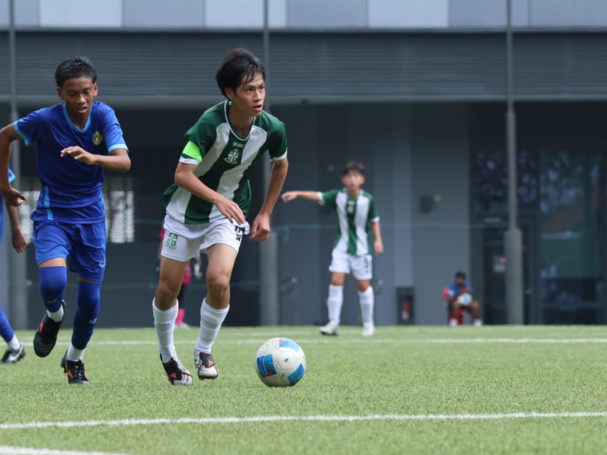 CDiv captain going for the ball